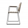 Fauteuil extérieur senior HPL ajouré aspect chêne clair et structure en acier